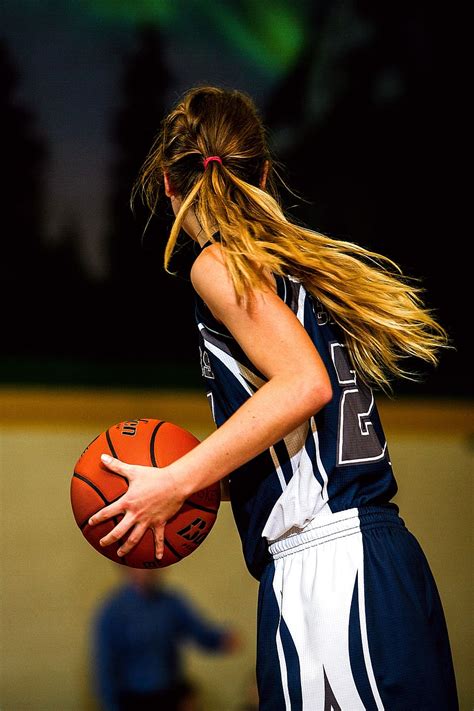 Hd Wallpaper Woman In Blue And White Basketball Jersey Holding Brown