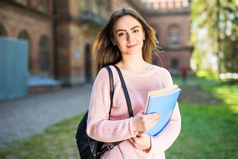 University Student Girl Looking Happy Smiling With Book Or Notebook In