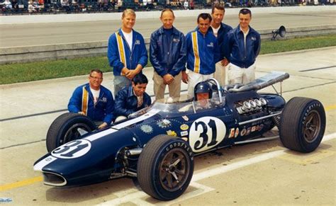 Dan Gurney And His Colour Co Ordinated Team In An Eagle