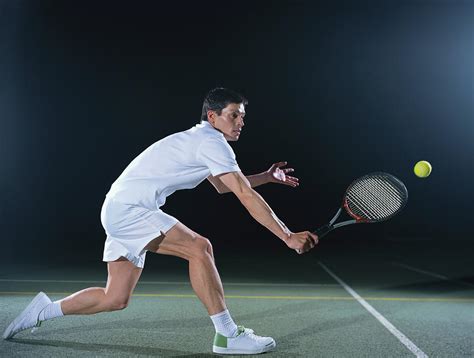 Man Playing Tennis On Outdoor Court Photograph By Bob Thomas Fine Art