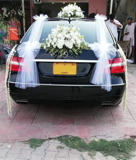 If you've cared to notice, the little wedding car has a life of its own. Mercedes Benz Decoration - Wedding Car Decoration with Flowers