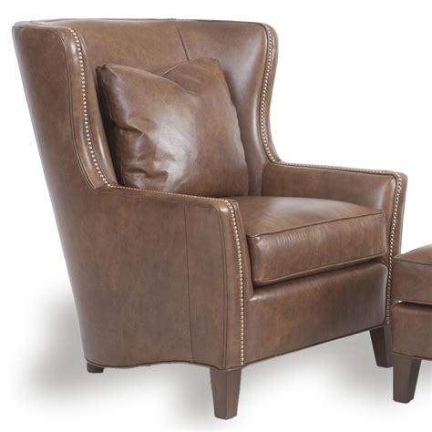 Just what you need to spice up any setting, each item in this collection is generously upholstered and artistically tailored to meet all your style and quality needs. Wingback Chair and Ottoman by Smith Brothers | Wolf and ...
