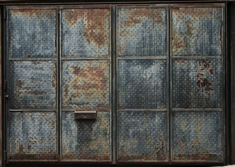 Rusted Metal Doors Photograph By Robin Mahboeb Fine Art America