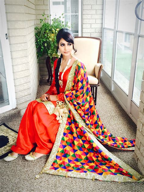 Punjabi Patiala Salwar Suit With Colorful Phulkari Traditional Jewellery Rani Har And Paranda