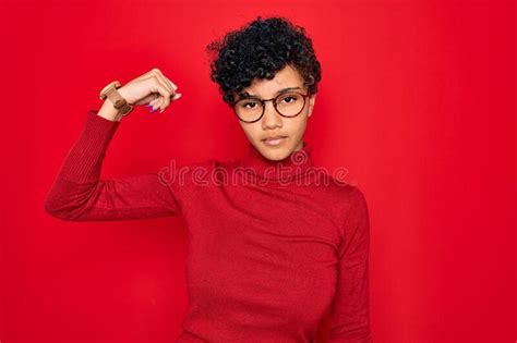 Young Beautiful African American Afro Woman Wearing Turtleneck Sweater