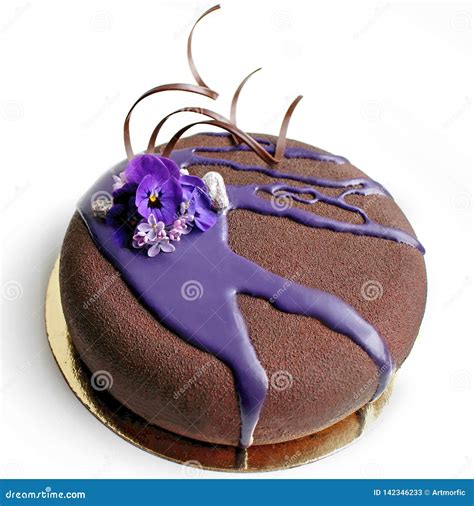 Chocolate Textured Mousse Cake With Spring Flowers And Purple Mirror