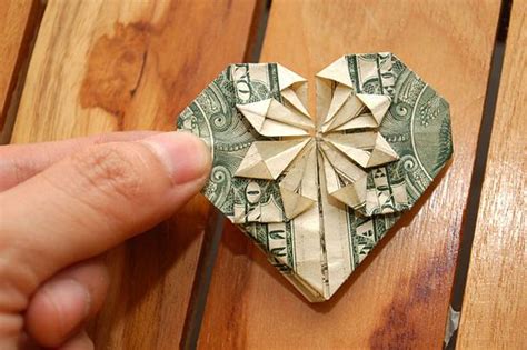 Fold along the folded edge on the back. Fold a Dollar Into a Heart | Dollar bill origami, Dollar ...