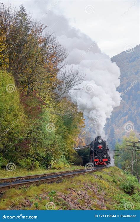 Vintage Black Steam Locomotive Train With Wagons On Railway Stock