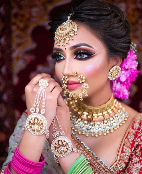 18 Gorgeous Oversized Bridal Nath Designs Idea Bridal Nose Ring Indian Bride Makeup Bridal