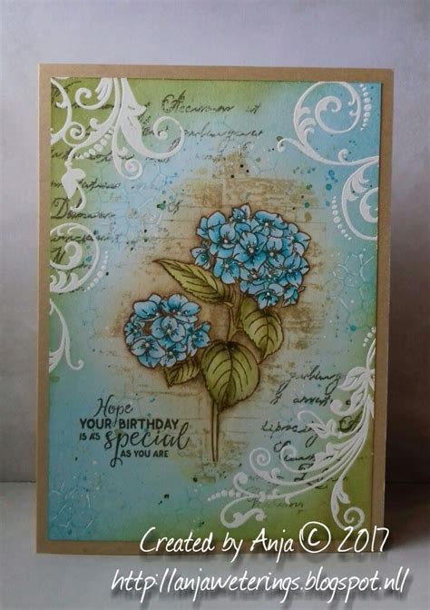 A Card With Blue Flowers On It