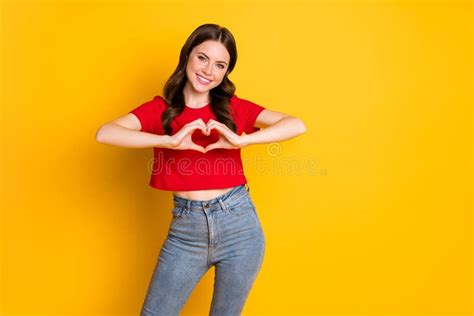 Photo Of Positive Girl Make Fingers Heart Show Passionate Love Sign