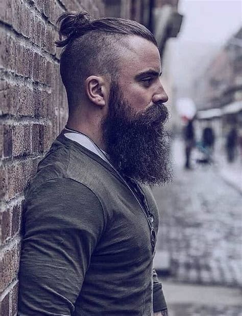 A man bun hairstyle always manages to stand out. Man Bun on Shaved Sides - Short Sides Long Top Hairstyles ...