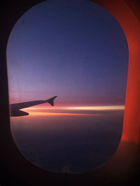 A Sunset On A Plane Travel Aesthetic Airplane View Airplane