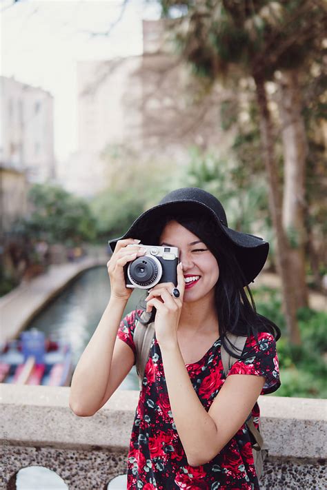 Smiling Tourist With A Camera By Stocksy Contributor Paff Stocksy