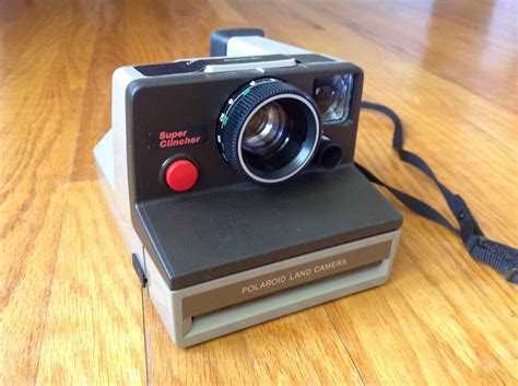 vintage tan super clincher polaroid land camera sx 70 film