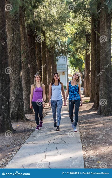 Three Young Ladies Walking In The Park Stock Image Image Of