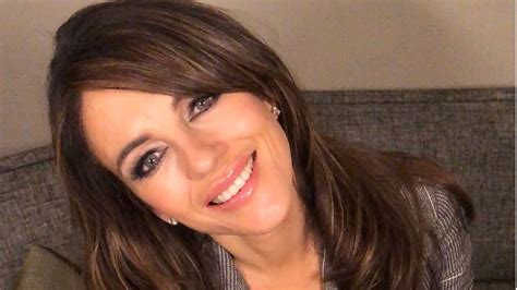 Elizabeth Hurley Skips The Gym To Relax In Revealing Dress