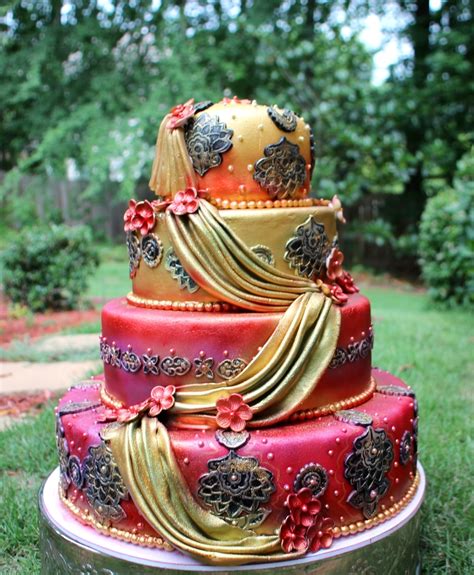 The first and foremost step is to you can draw inspiration from this cake design that has a cupid's arrow striking the two engagement rings which makes it a perfect announcement. Indian Design Wedding Cake - CakeCentral.com