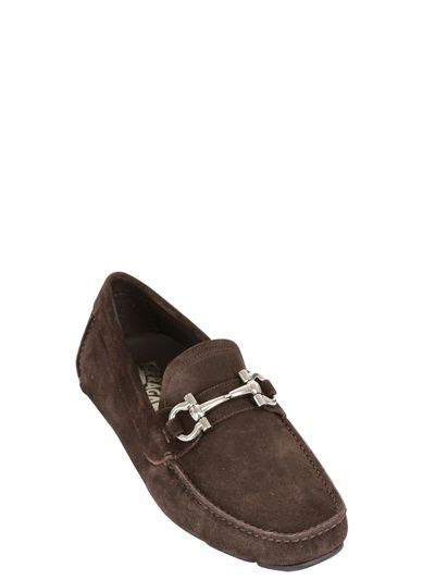 Salvatore ferragamo chukka boots comes in a solid suede material, with a contrast white lace, a branded insole, and a contrast sole. SALVATORE FERRAGAMO - PARIGI SUEDE LOGO LOAFERS ...