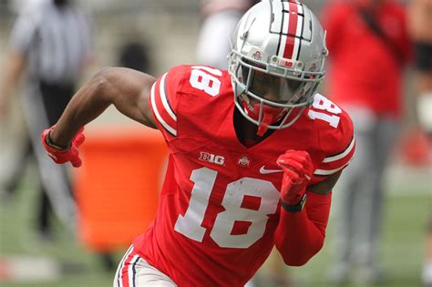 watch ohio state football freshman marvin harrison jr s first touchdown catch in the rose bowl