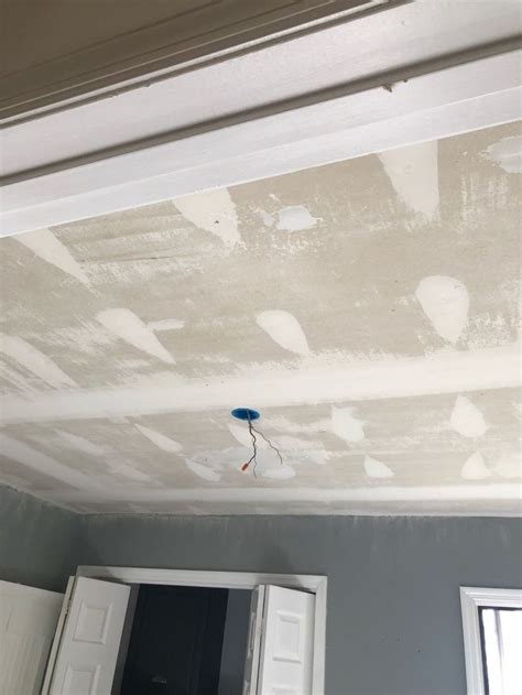 Textured ceiling removal is best left to the ceiling experts. How to Remove Popcorn Ceilings Like a Pro - Smoothing ...