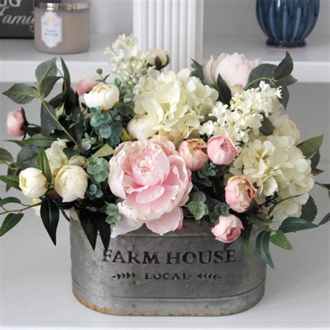 Faux flowers don't just come in bouquets, they also come in single stems, arrangement, wreaths and garlands and dunelm's selection is good for this. French Country/Cottage Decor~Modern Farmhouse Arrangement ...