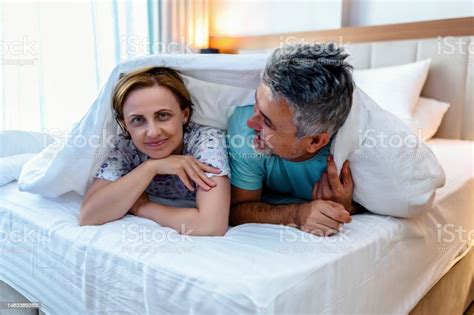 Loving Couple In Bed Stock Photo Download Image Now 45 49 Years 50