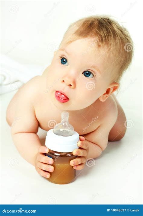 Baby Drinking Juice Stock Image Image Of Emotion Curious 10048037