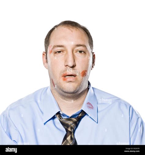 Businessman With Lipstick Kiss Marks All Over His Face Stock Photo Alamy