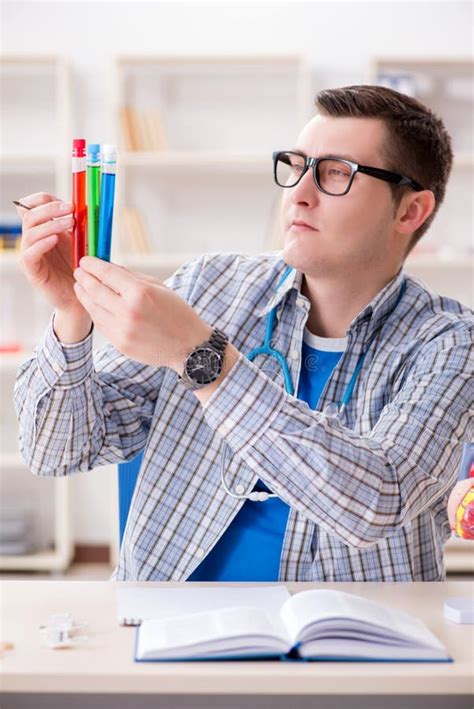 The Young Student Studying Chemistry In University Stock Photo Image