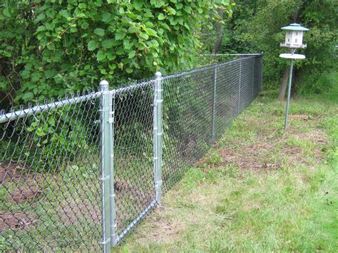 Use this double gate latch where 2 gates swing together. Chain Link | Sadler Fence and Staining LLC