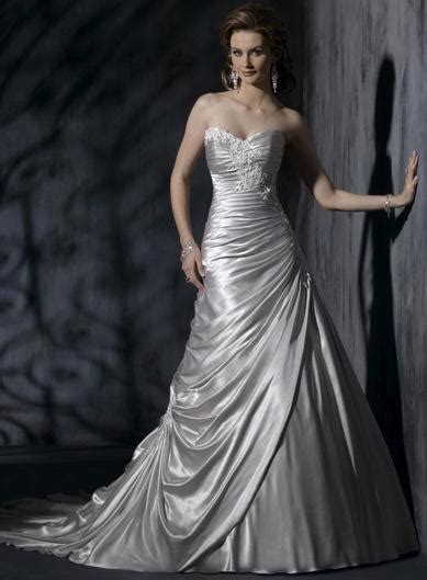 Most young girls dreaming about their wedding day envision walking down the aisle in a white gown. A Wedding Addict: Silver Wedding Dress with Soft Sweetheart