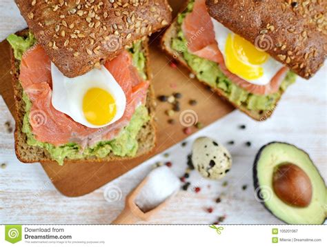 Smoked Salmon Sandwich With Avocado And Quail Egg Stock Image Image