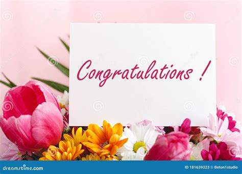 Congratulations Text On T Card In Flowers Bouquet On Pink Background