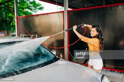 Woman Wash Car Photos And Premium High Res Pictures Getty Images