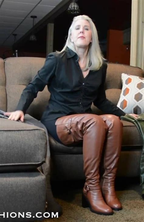 Amateur Mature Blonde Seated On Couch Modeling Brown Leather Thigh