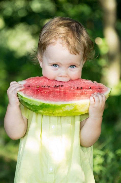 Baby Eating Watermelon Stock Image Colourbox