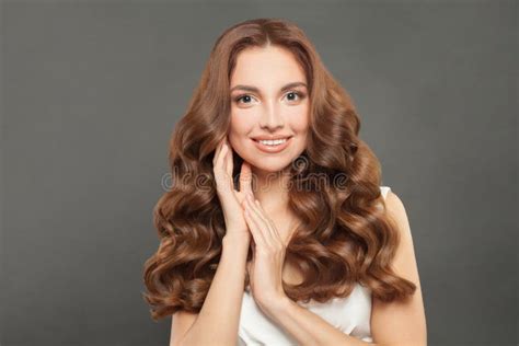 Portrait Of Beauty Brunette Woman With Long And Shiny Wavy Brown Hair