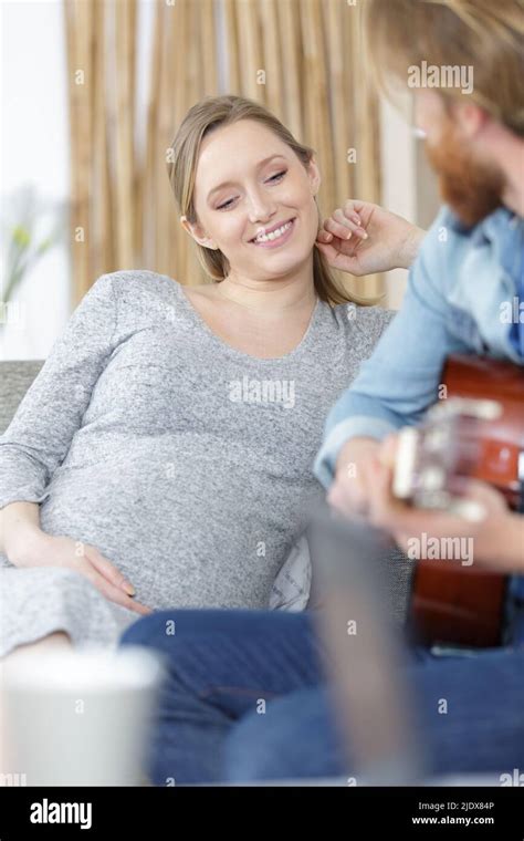 Pregnant Woman Playing Guitar Hi Res Stock Photography And Images Alamy