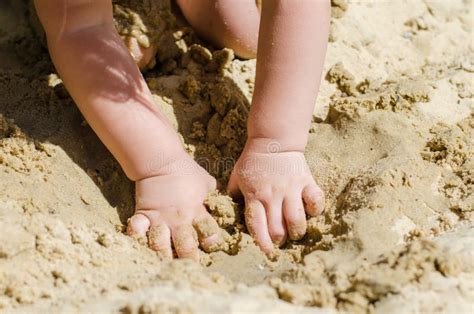 The Child Is Digging In The Sandbox Stock Photo Image Of Nature