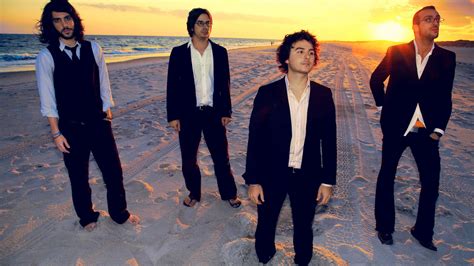 Four Member Of Boy Band On Sand Hd Wallpaper Wallpaper Flare