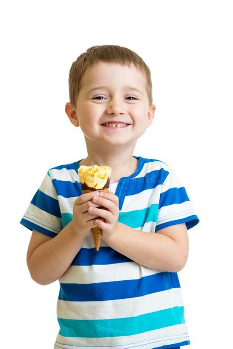 Happy Kid Boy Eating Ice Cream In Studio Isolated Stock Image Image