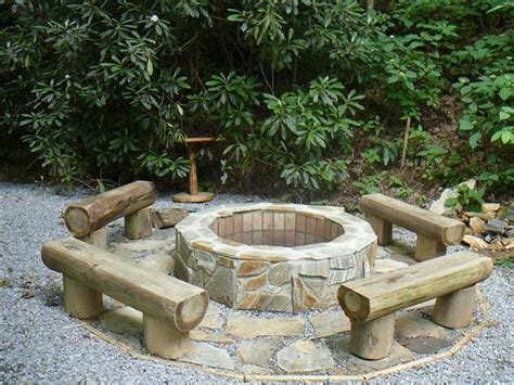 The allure of sitting around. log seats around fire pit | Outdoors | Pinterest