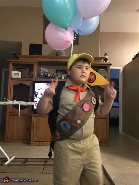 I used 1.5 wooden discs and my printer to make the badges. Russell from UP Costume | Best DIY Costumes - Photo 3/3