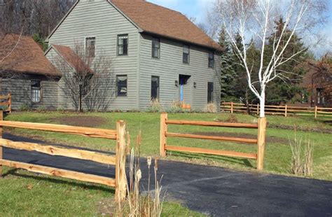 This is a more common agricultural fence, seen here marking the boundary of a bright green meadow a simple farmhouse with low maintenance landscaping including a well aged split rail fence no more than 3 feet high. Split Rail Fences - Landscaping Network