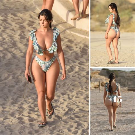 Demi Rose Proudly Showcases Her Stunning Curves On Ibiza Beach With