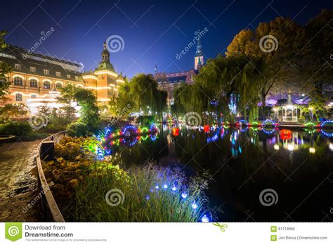 The Lake At Tivoli Gardens At Night In Copenhagen Denmark Stock