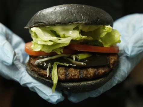 A Bite Into Japans All Black Burger Going Out Gulf News