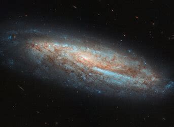 Meet ngc 2608, a barred spiral galaxy about 93 million light years away, in the constellation cancer. ESA - One amongst millions