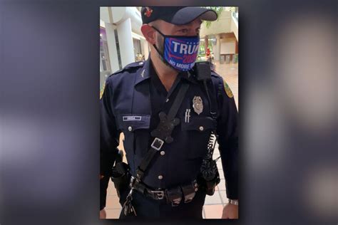 On Duty Miami Police Officer Busted For Intimidating Early Voters At